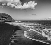 Leave-Only-Footprints-Black-Beach-Santorini-Greece-1-of-1-Copy-scaled