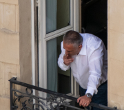 Man-SMoking-in-Window